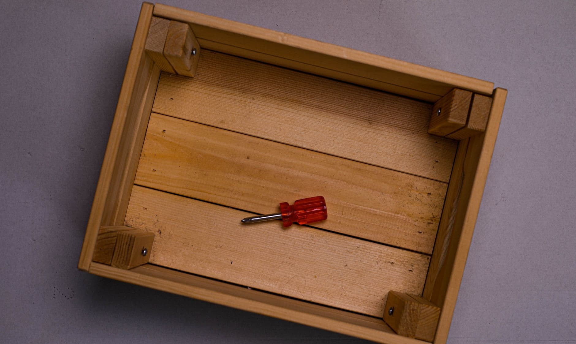 Close-up of finger joints on a wooden box corner