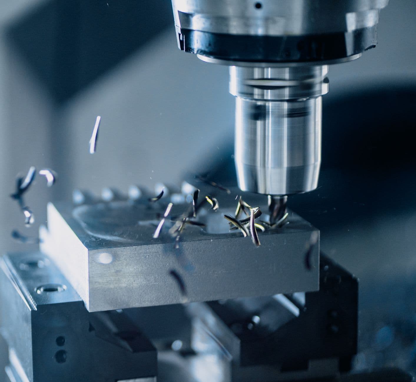 A CNC machine cutting a metal part
