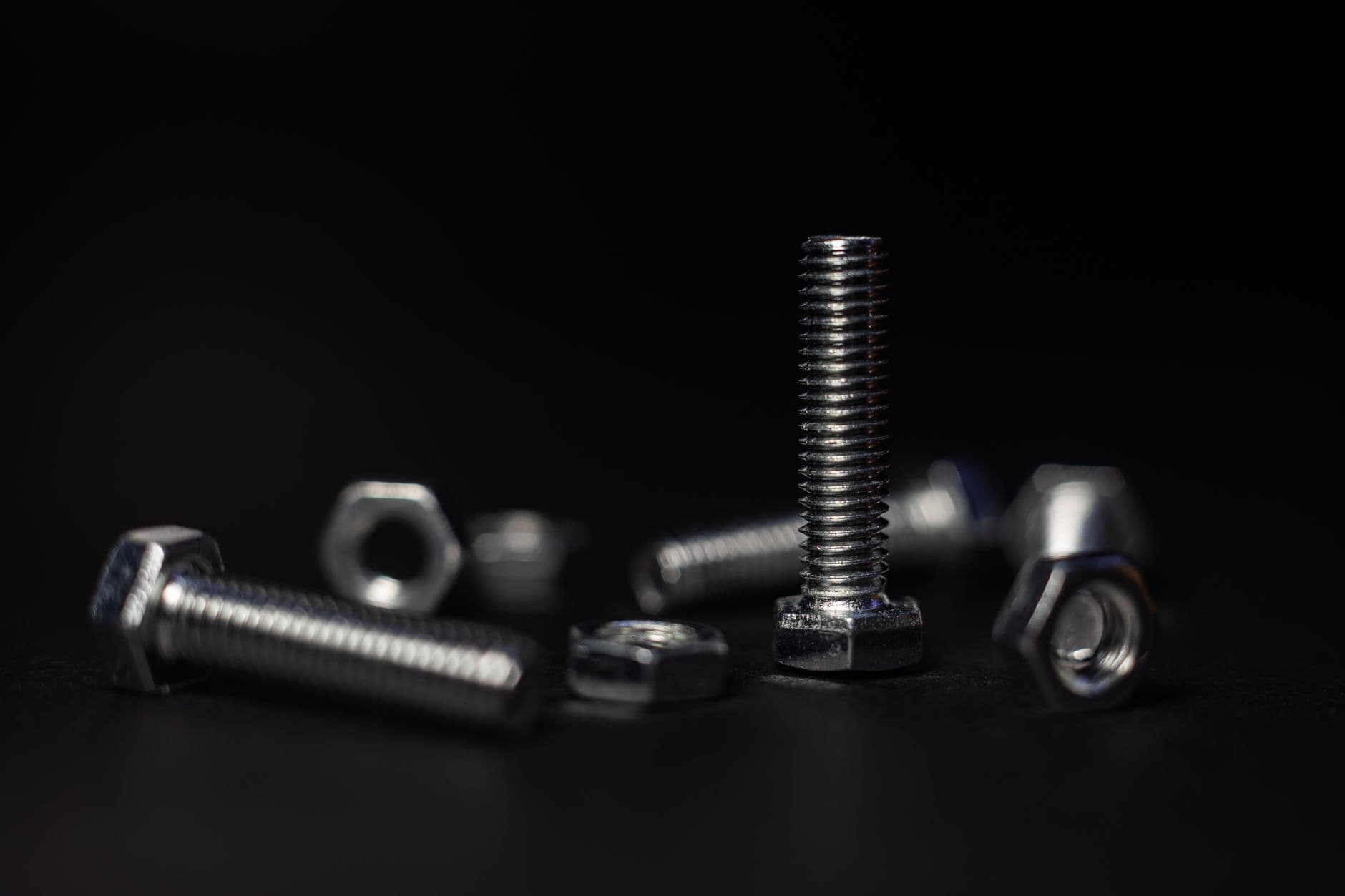 Macro photograph of the threads on a metal bolt